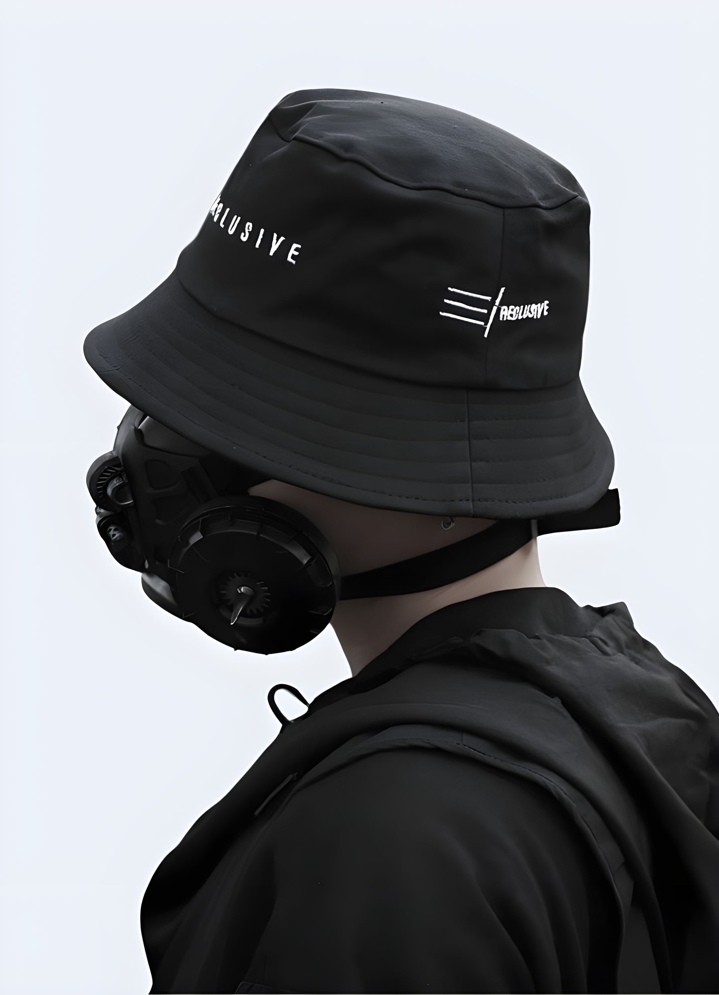 Man wearing Japanese bucket hat, side view, minimalist streetwear style.