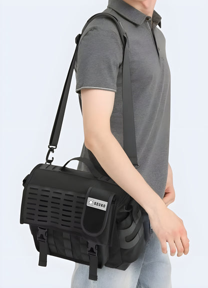 Large messenger bag flap closure with snaps.