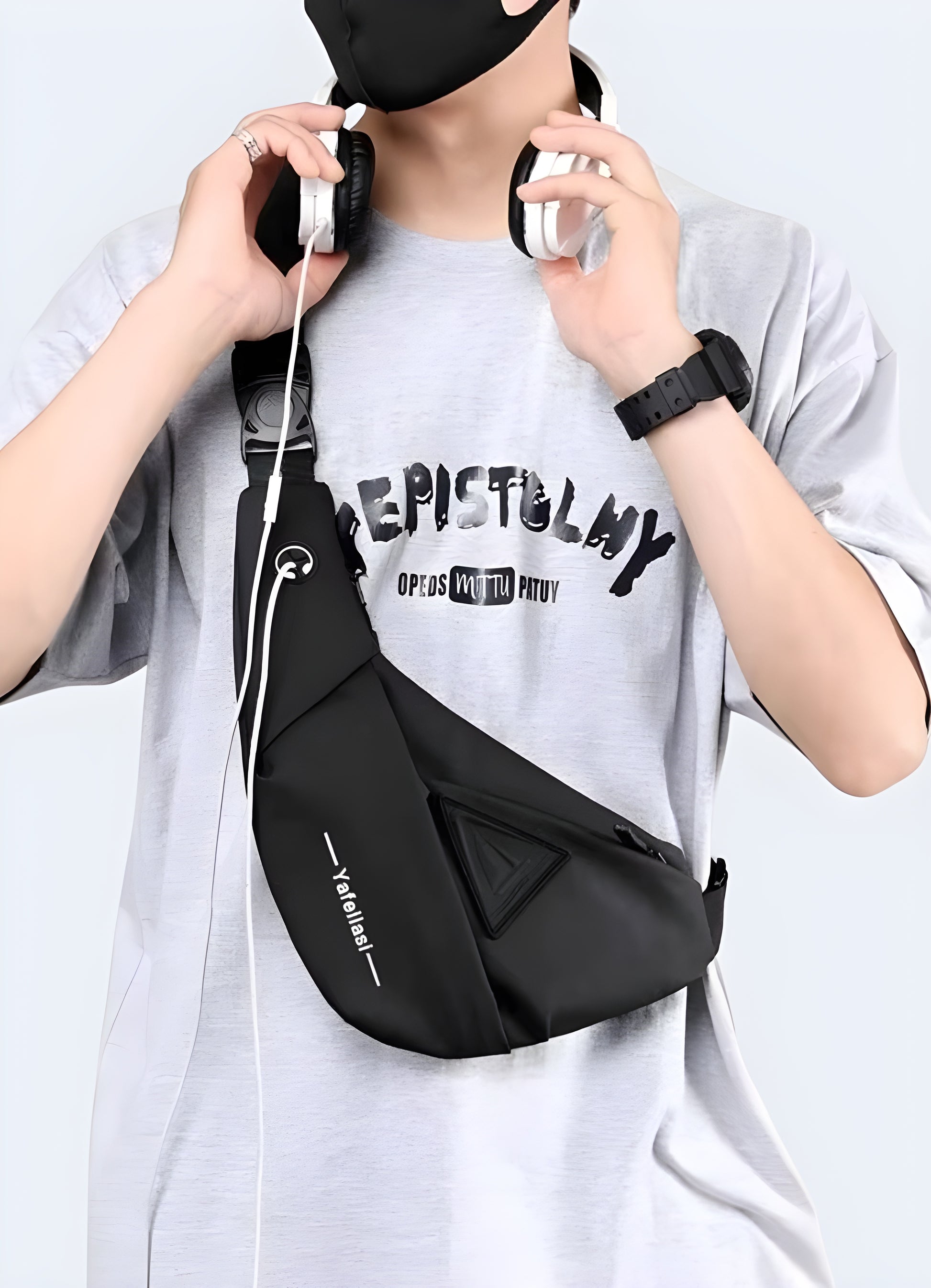 Man wearing a tactical crossbody bag, front side view, highlighting its rugged design.