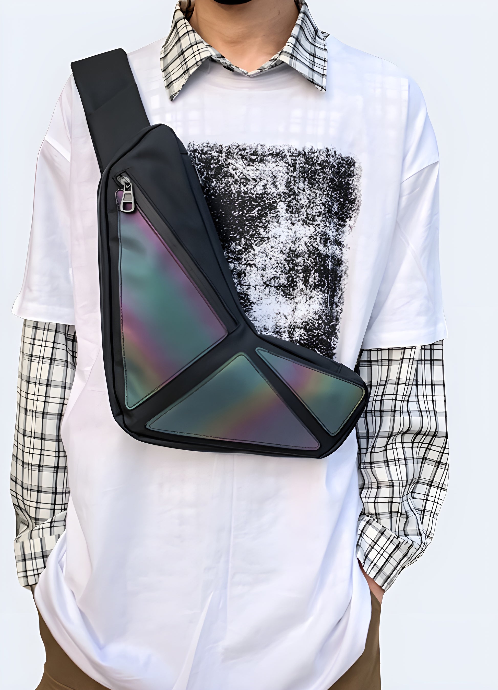 Man wearing a reflective sling bag, front view, showcasing modern and functional style. Ideal for visibility and fashion.