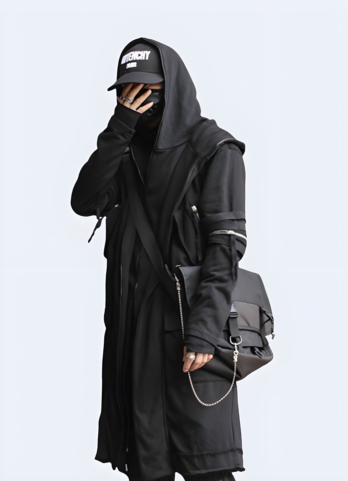 Elevate your techwear style with this iconic trench coat.  