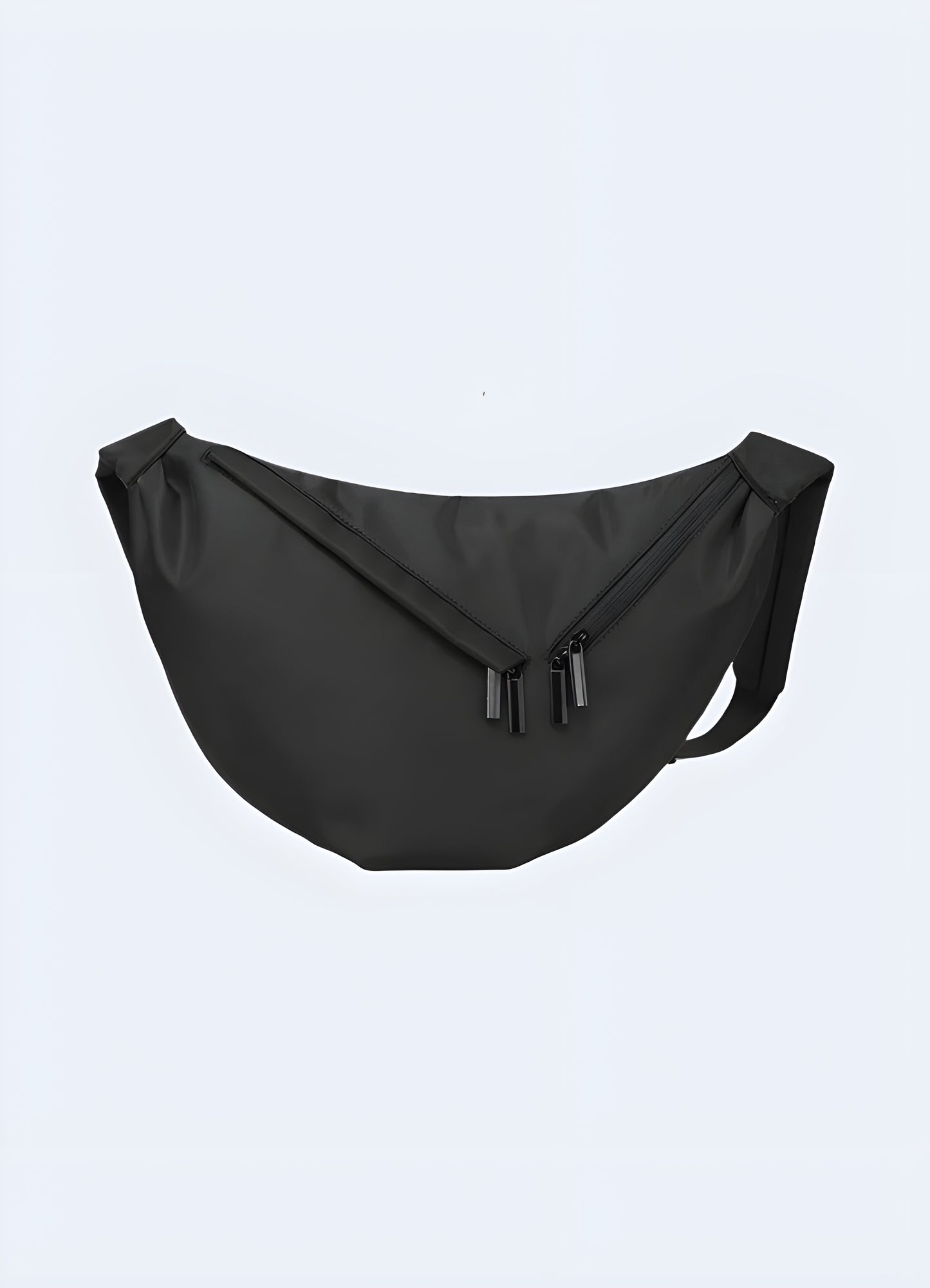 Male model wearing black urban sling bag – front view showcasing techwear-style crossbody chest bag with multiple secure pockets and adjustable strap, perfect for city wear and travel.
