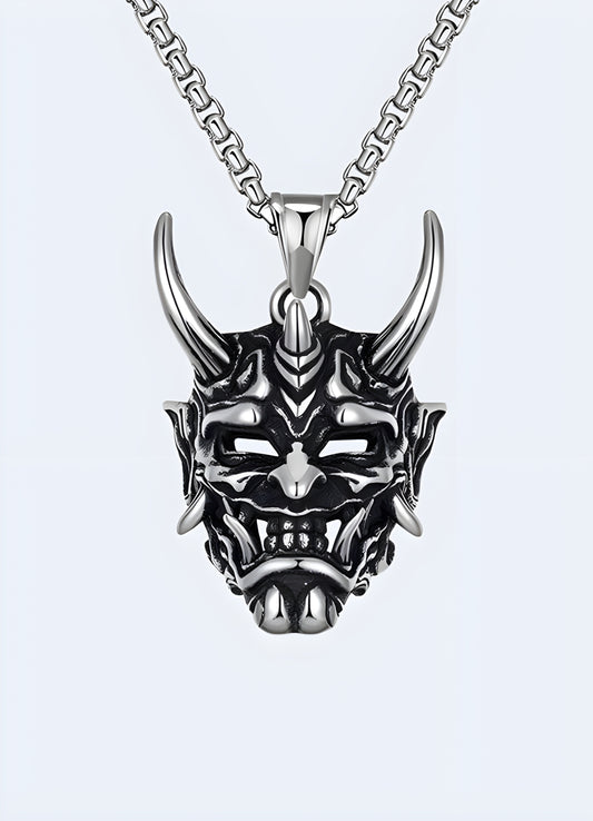 Japanese oni mask pendant antique brass metal.