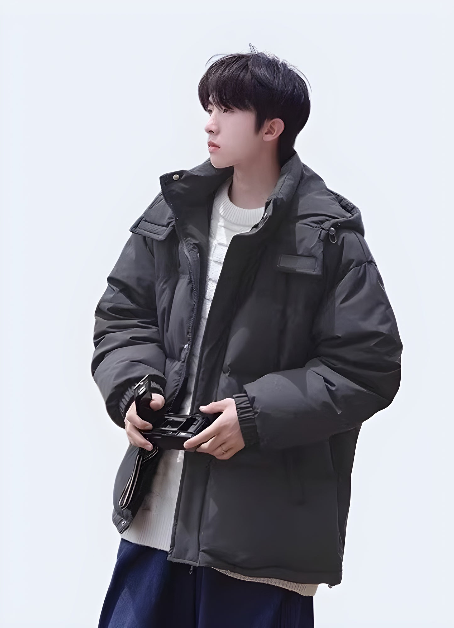 Stay warm and dry in even the harshest weather conditions with this Streetwear Puffer Jacket.