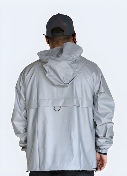 Stay safe and stylish with this reflective hoodie that shines bright in low light conditions.