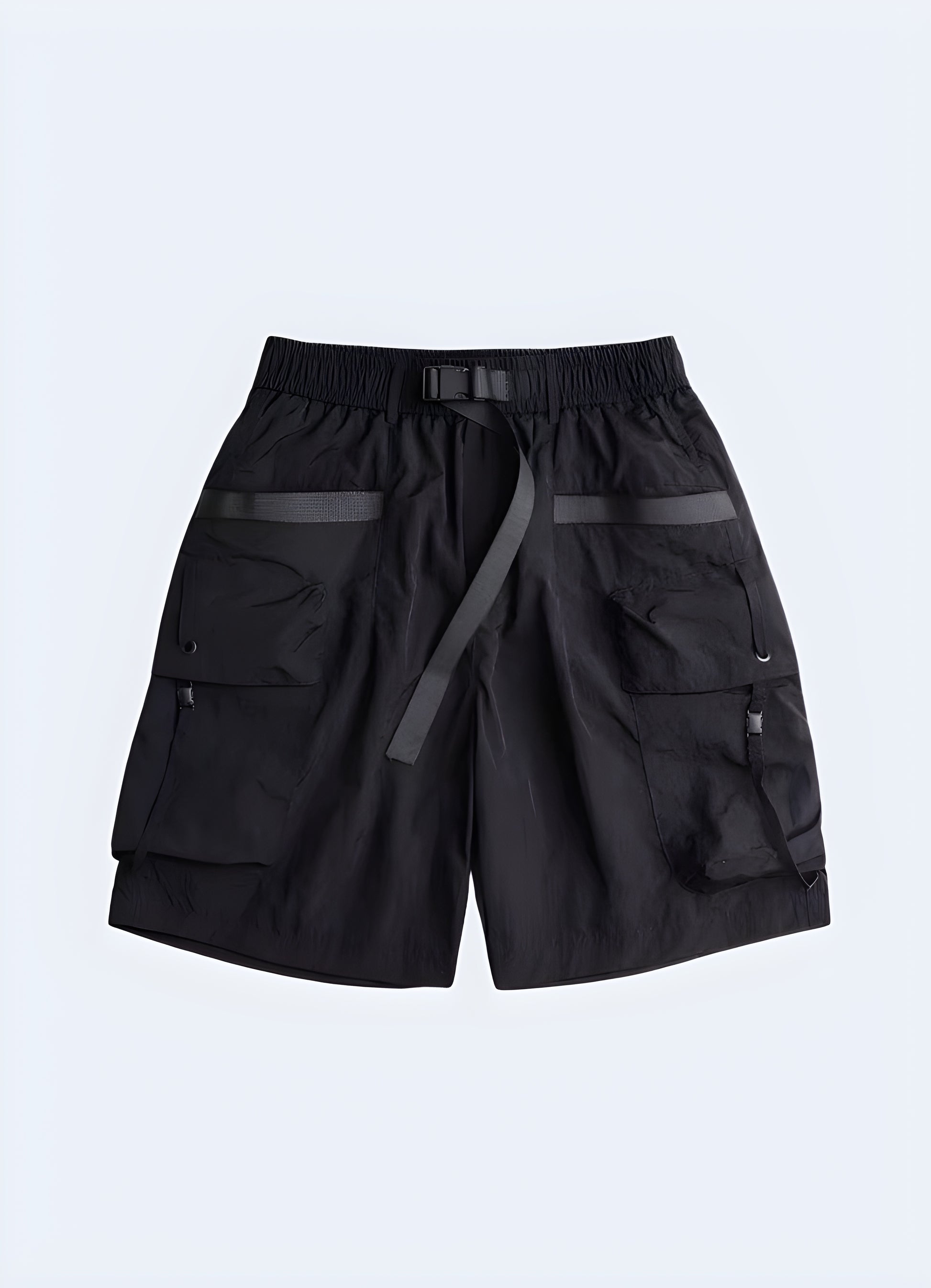 Samurai shorts in black, front view, worn by a model, showcasing the unique blend of traditional Japanese aesthetics and modern techwear style in the AU.