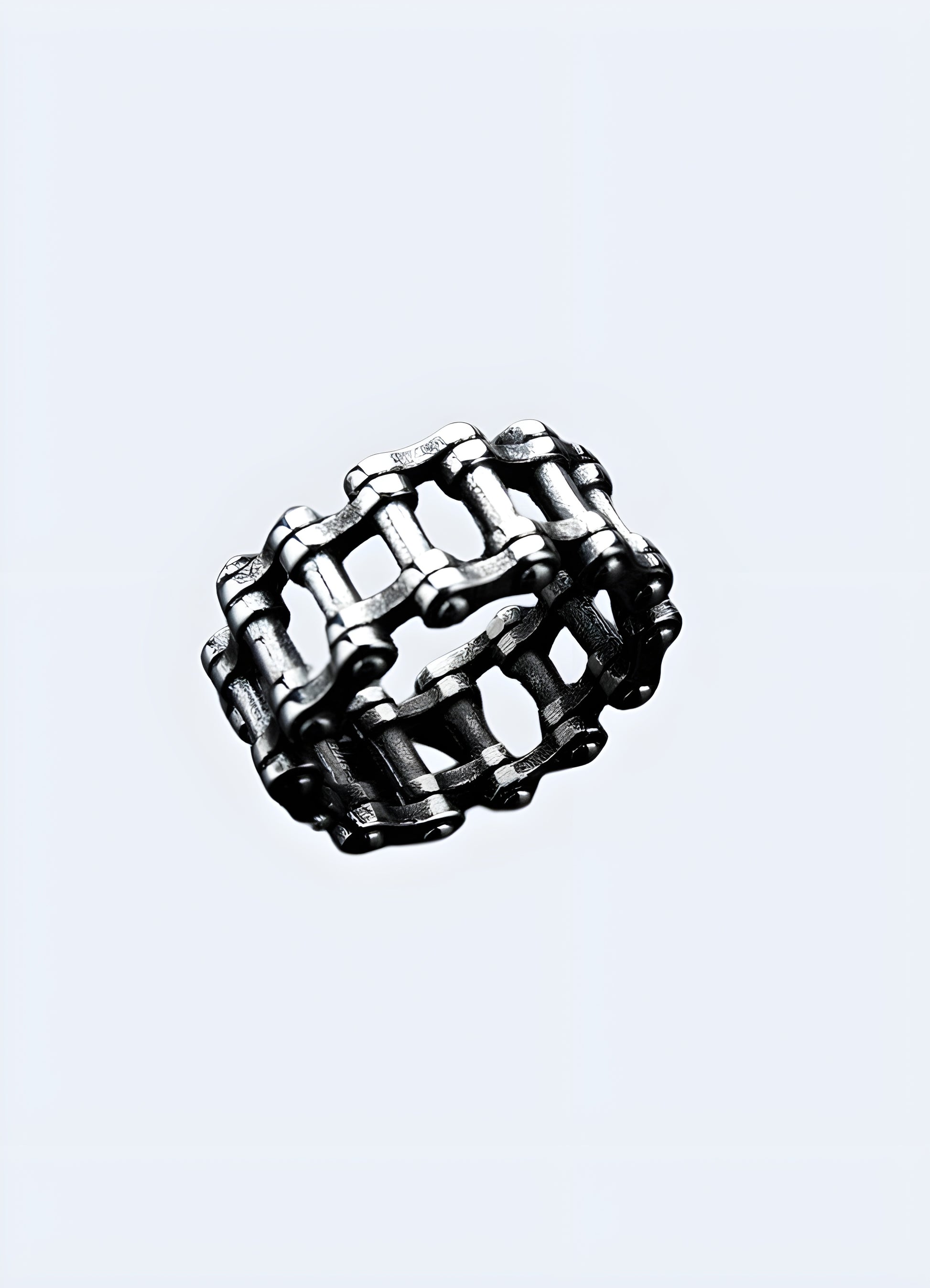 Sterling silver integrated chain detail ring.