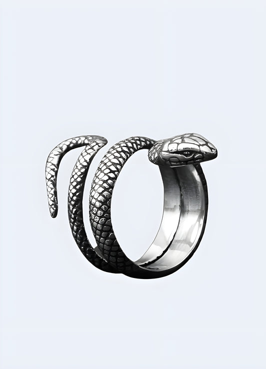 Brushed silver snake coils gracefully around your finger in this charming pinky ring. 