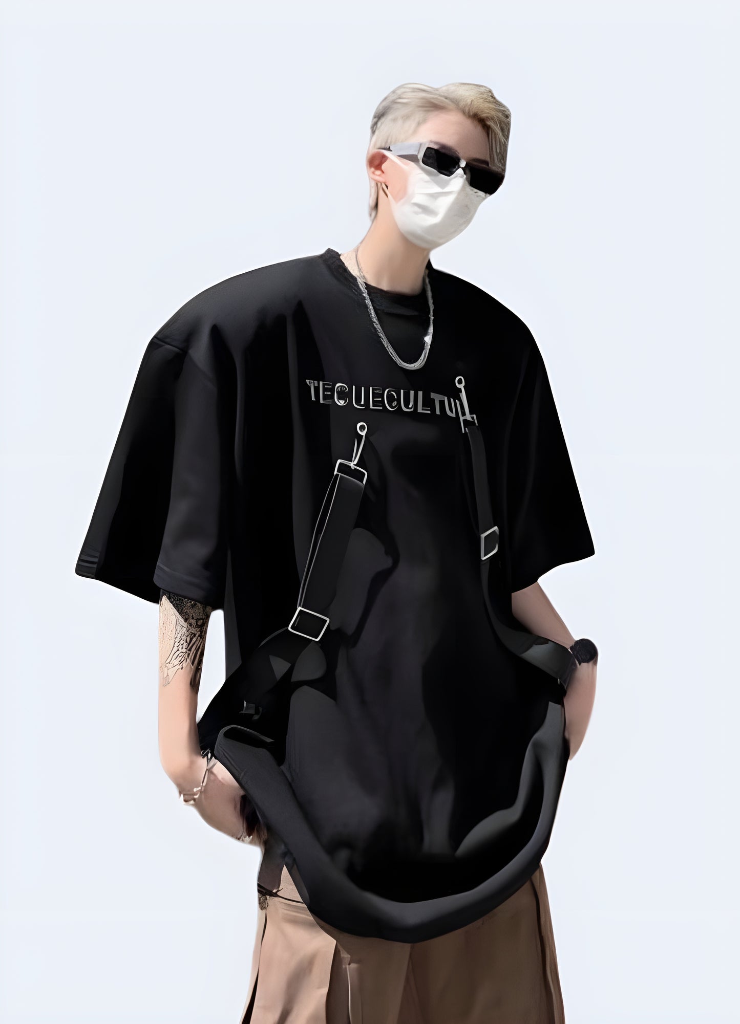 Short sleeve tee with strap details standard unisex fit.