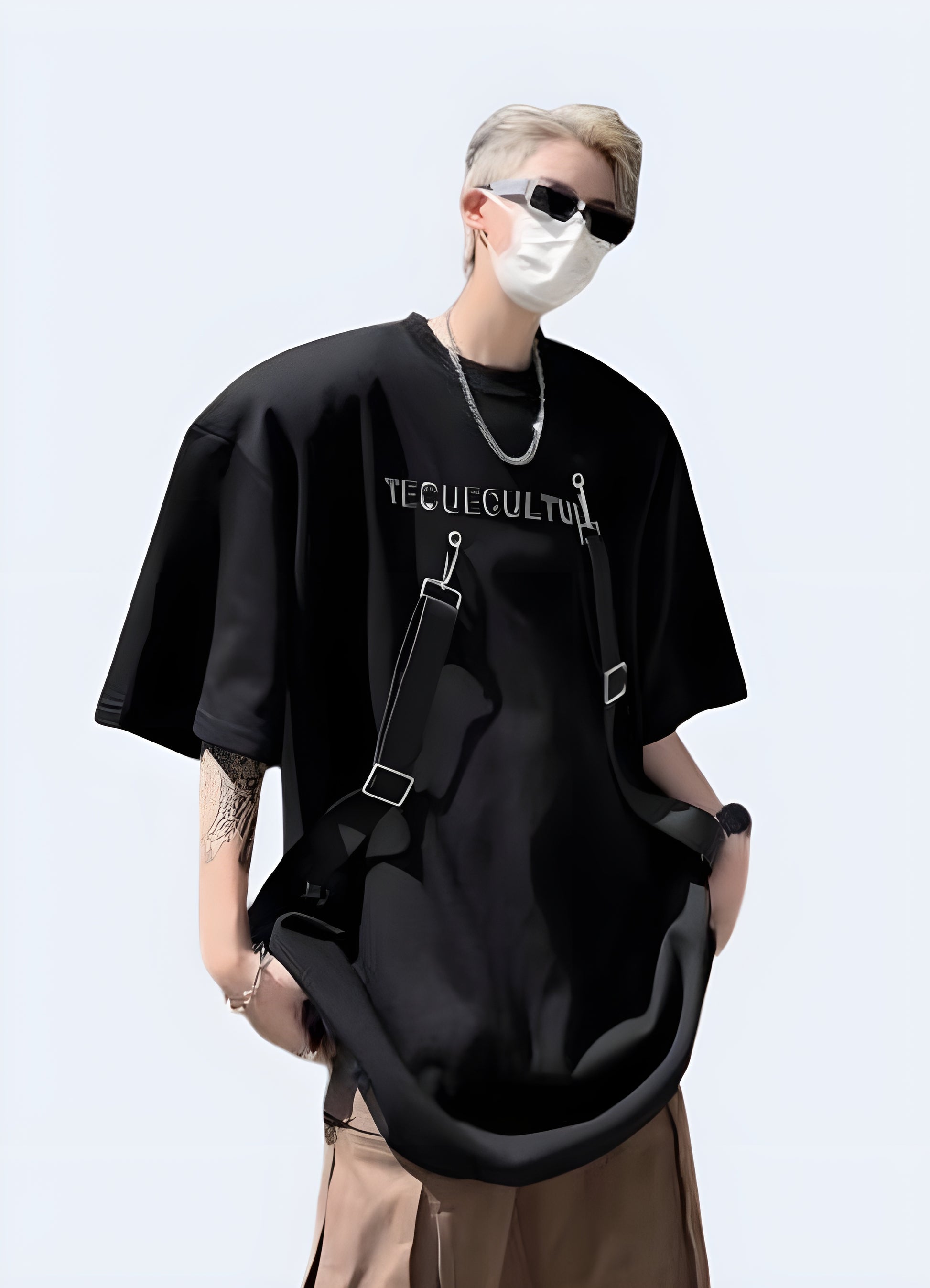 Short sleeve tee with strap details standard unisex fit.