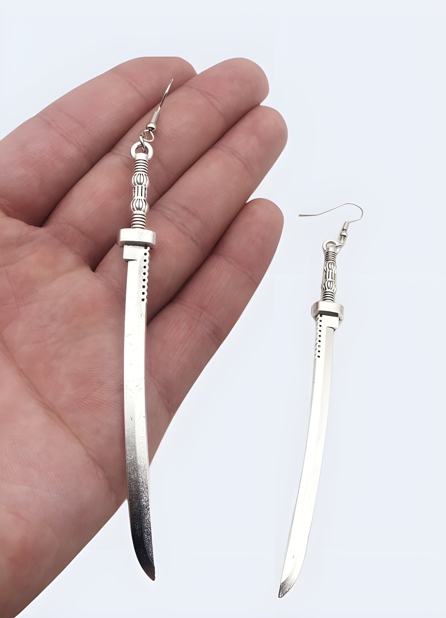 Hook backings 2 inches long sword earrings.