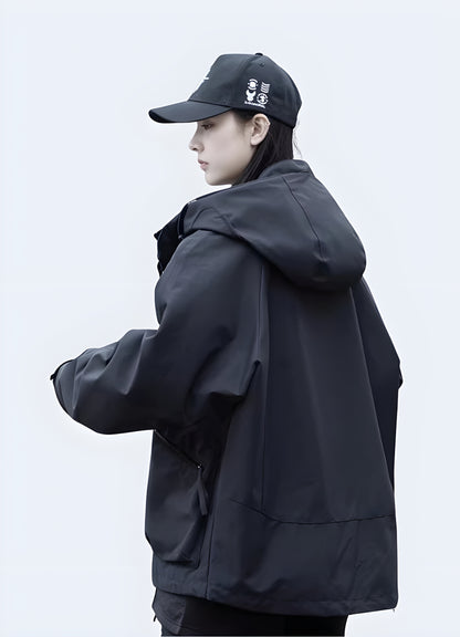 Side view of techwear raincoat in black – regular fit with ergonomic cut, lightweight and breathable, ideal for urban layering and weather protection, streetwear-inspired versatile jacket for men.