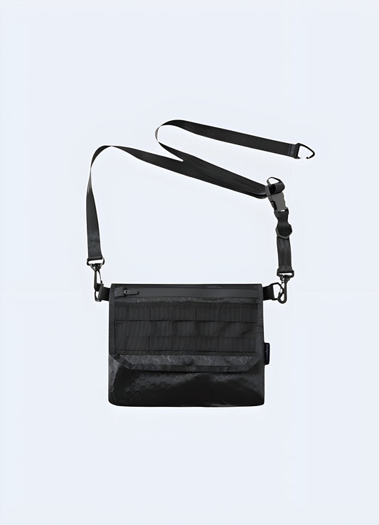 Techwear shoulder bag padded, adjustable strap long.
