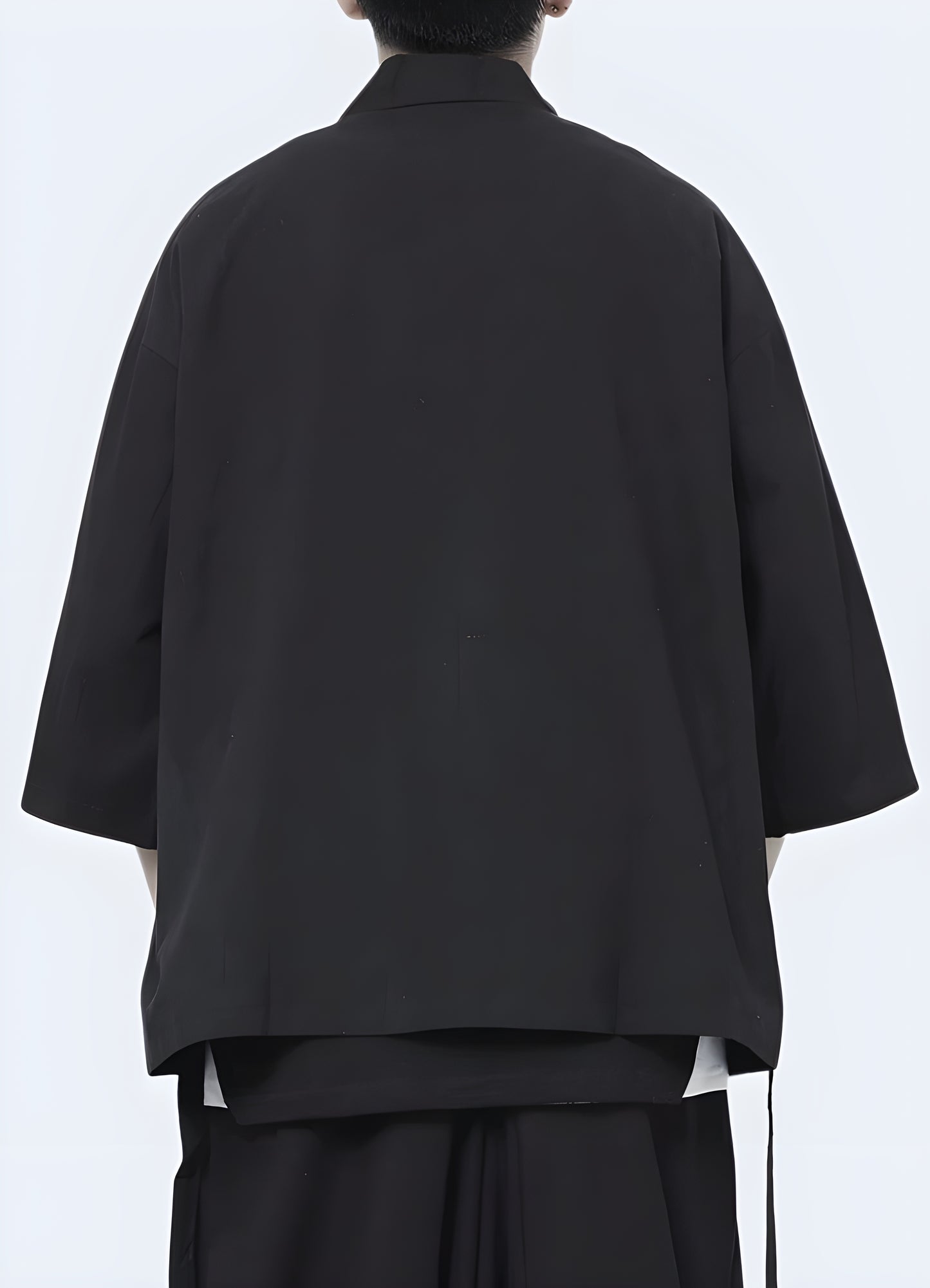 Urban streetwearinspired kimono jacket fits most body types.