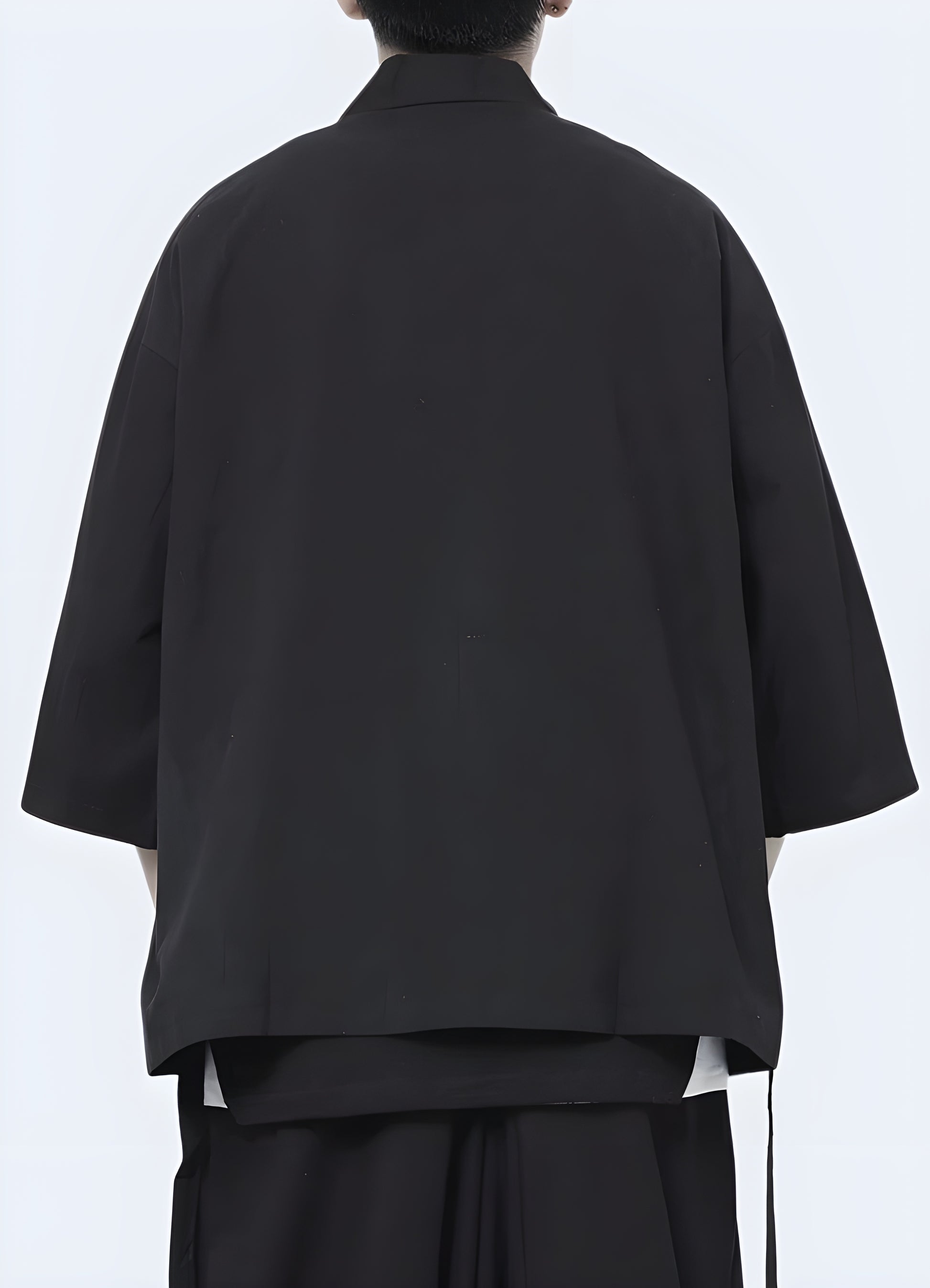 Urban streetwearinspired kimono jacket fits most body types.