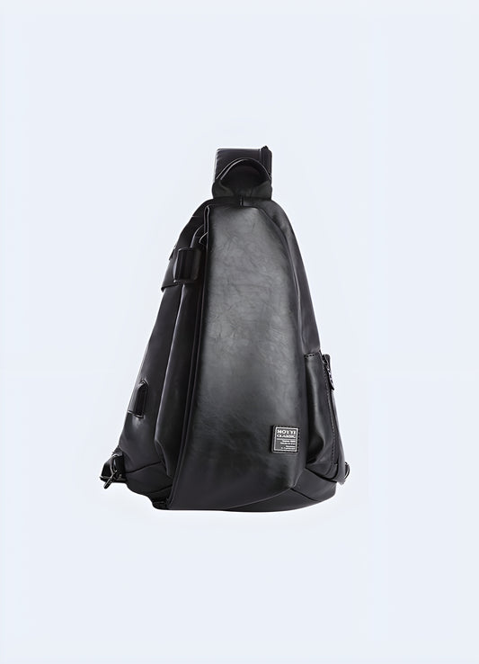 Immerse yourself in the thoughtful design of this chic black sling bag.