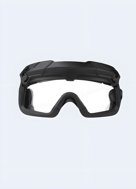 Smoke lenses, rubber grips, and an angular frame project a bold, tactical aesthetic.