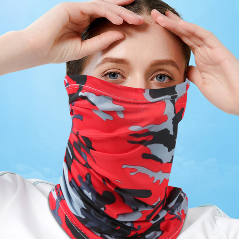 Woman wearing red camo half-face balaclava, front view. Protective balaclava covering lower face.