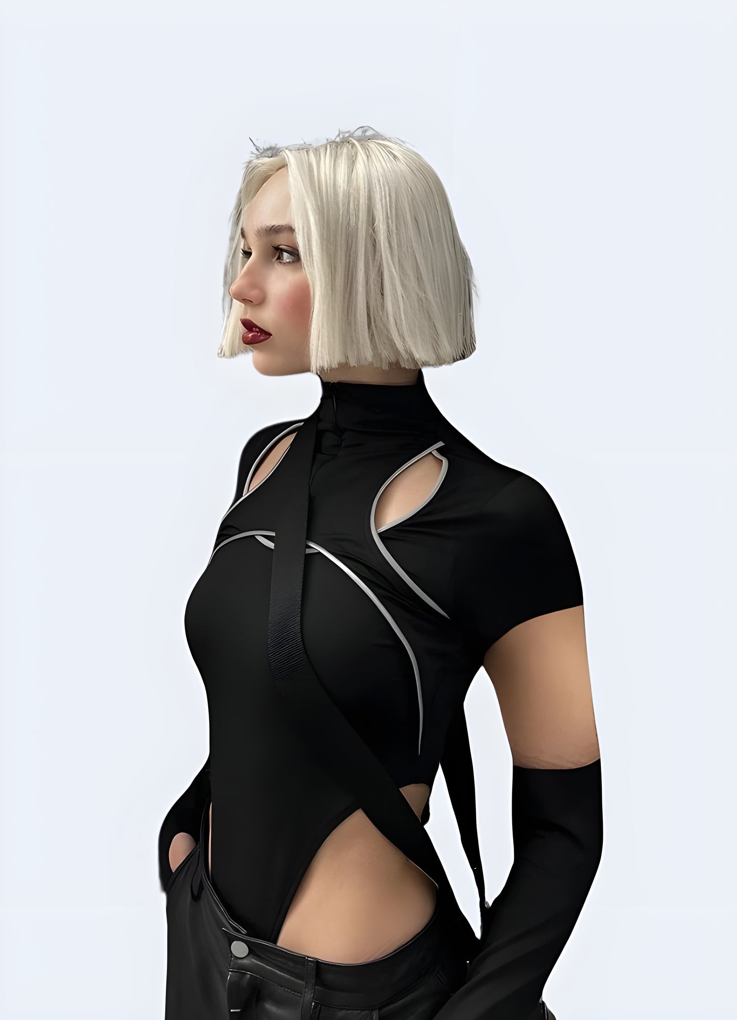 Side view of a woman in an elegant black turtleneck bodysuit, highlighting its versatility and chic appeal for UK fashion-forward individuals.