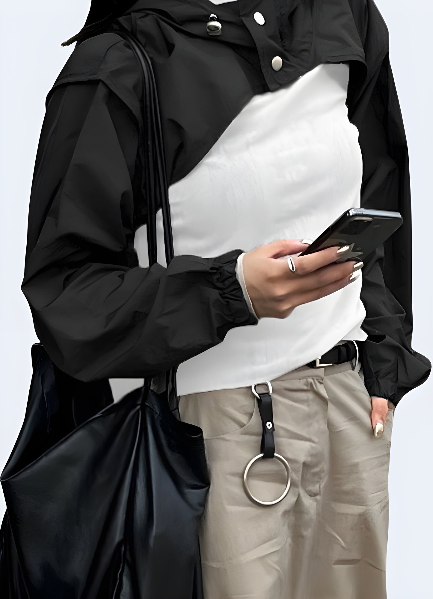 Women wearing black turtleneck crop top front view.