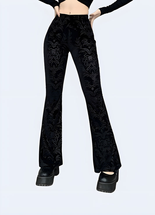Intricate brocade pattern in rich hues adds a touch of luxury to these elegant wide-leg pants.