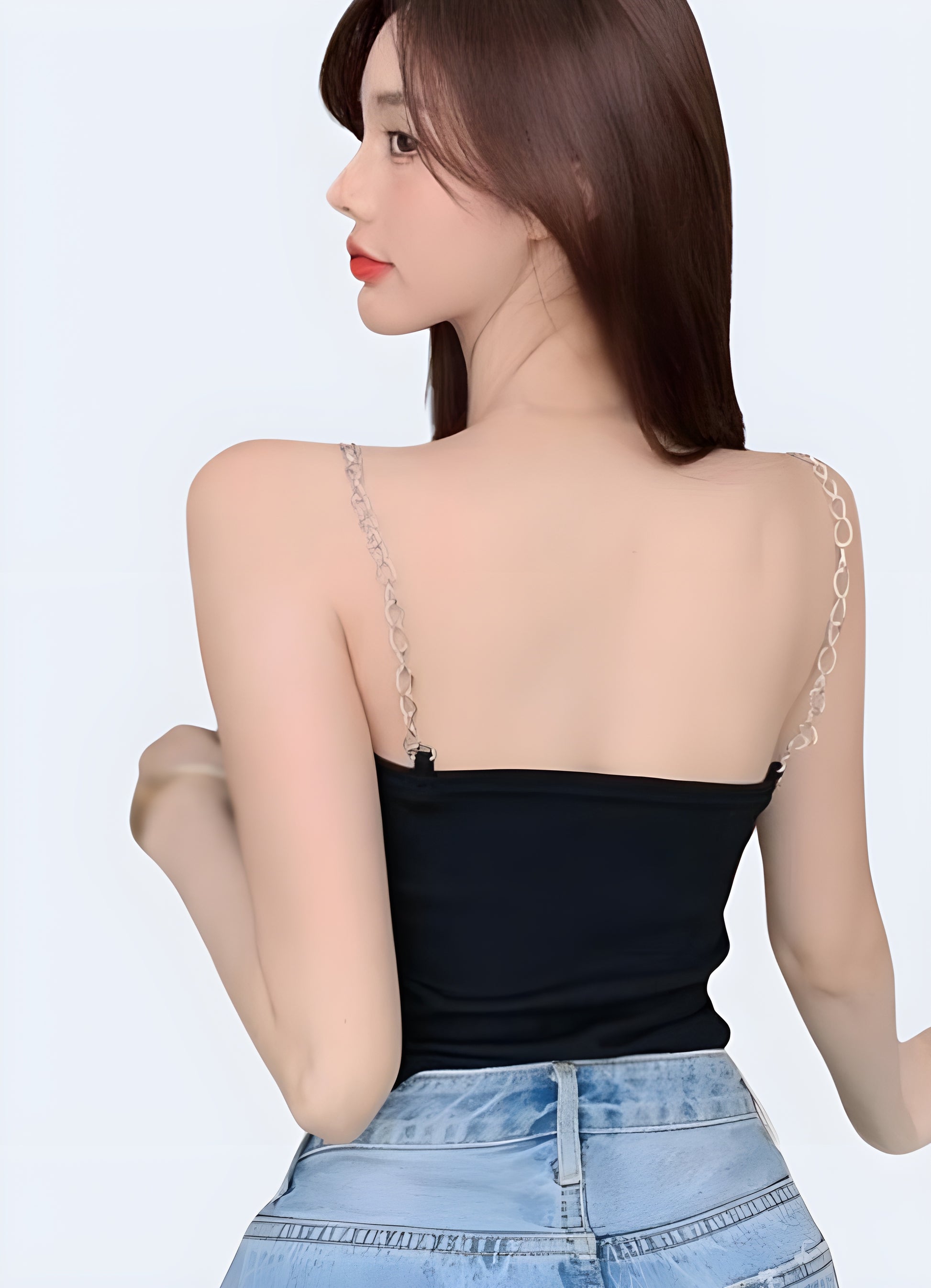 Women wearing black goth crop top back view.