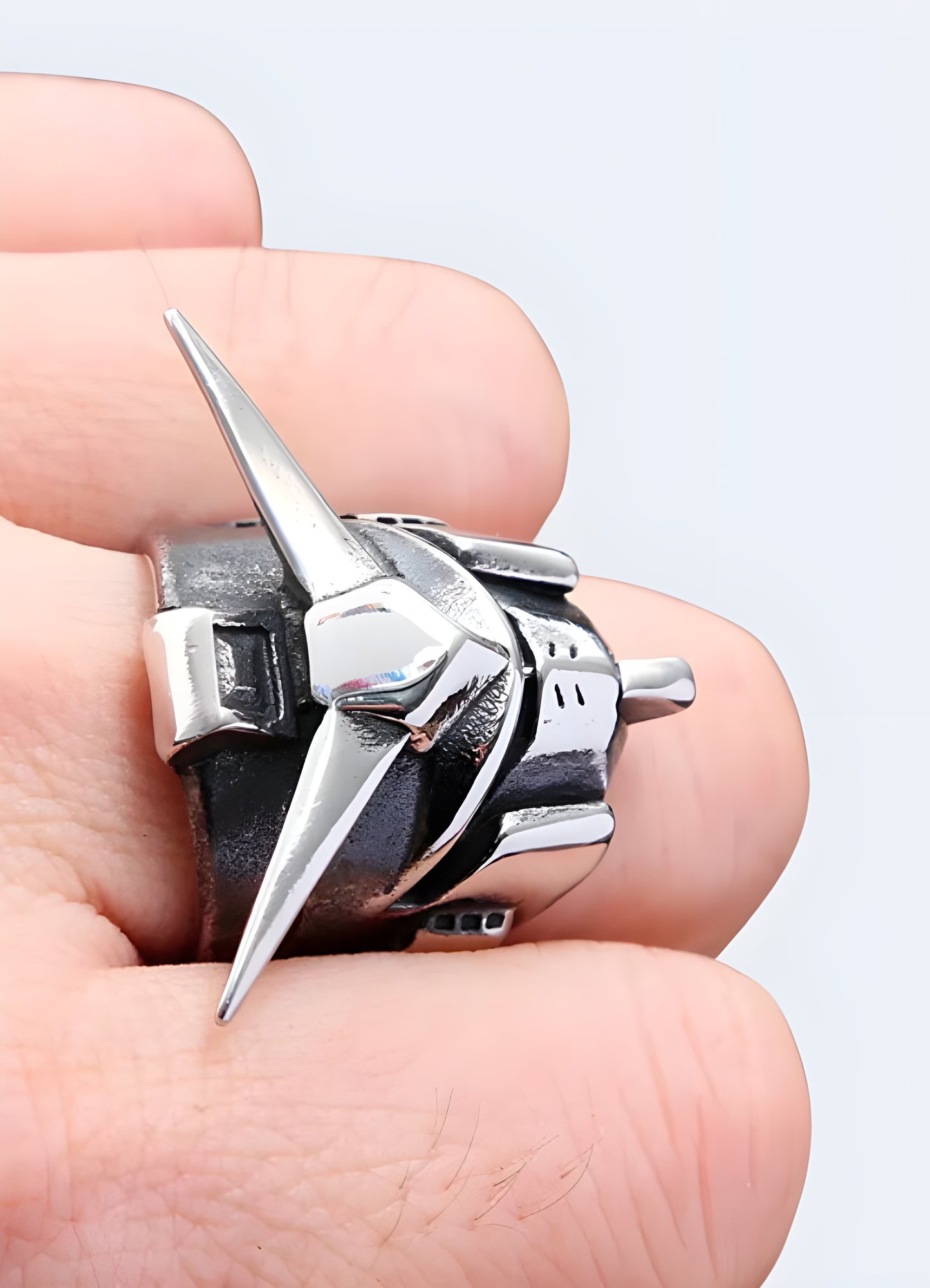 The gundam ring stands out as an emblem of where techwear converges with the evocative narrative of cyberpunk. 