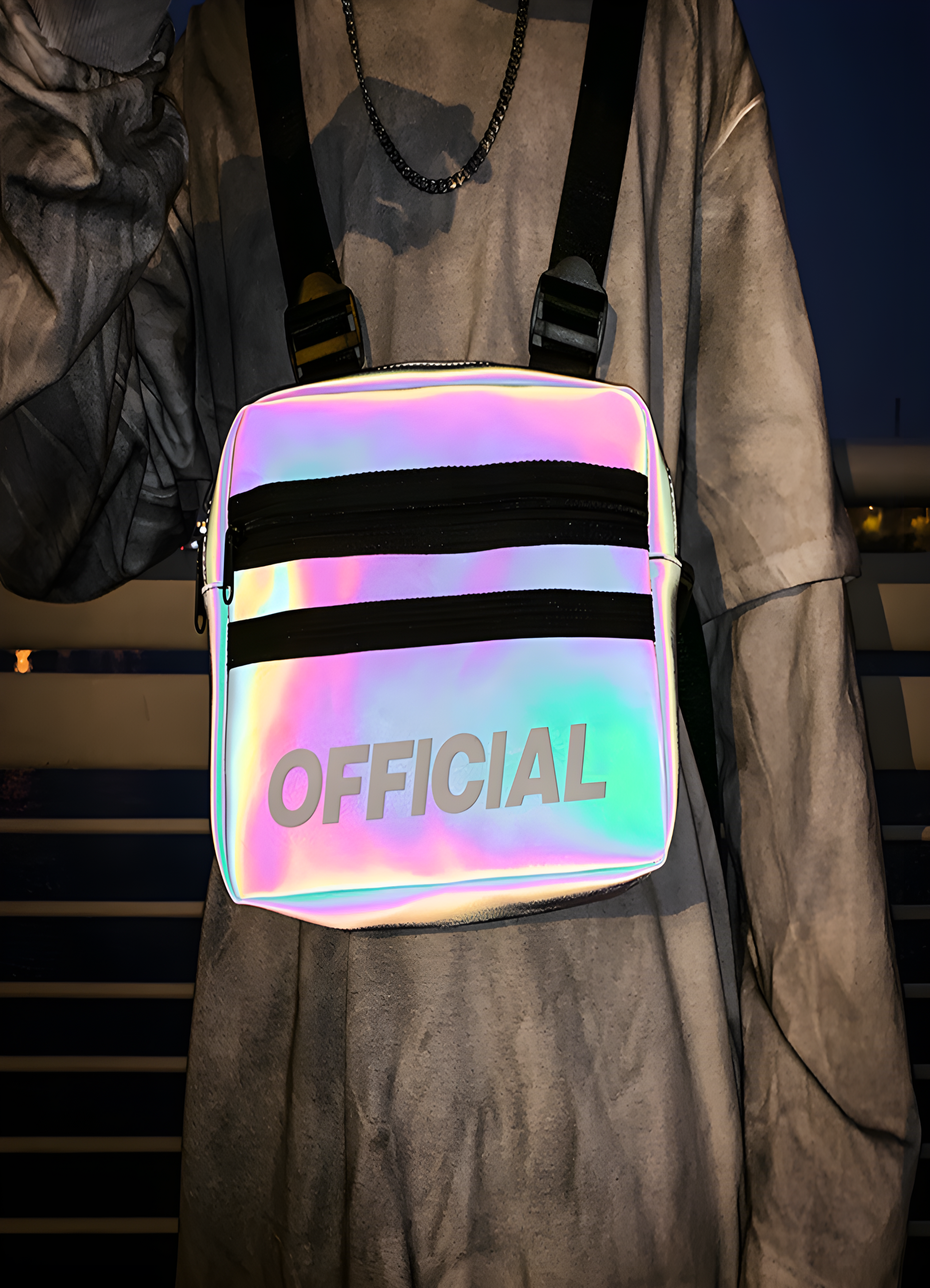 The chest bag is worn across her shoulder, with reflective materials and strategic detailing for added visibility in low-light environments. 