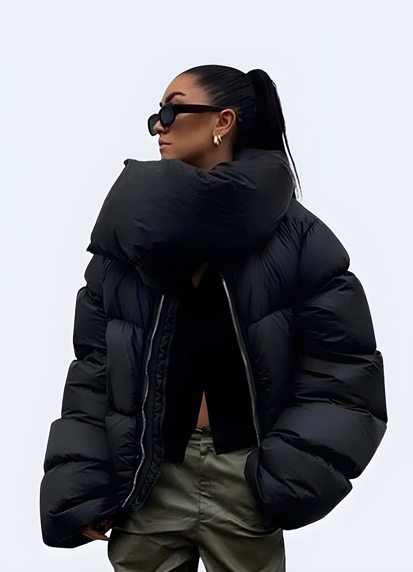 Winter puffer jacket women's zipper closure elasticized cuffs lock in warmth.